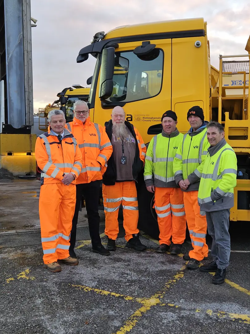 County Council gritting team with gritting lorry on site at Gamston