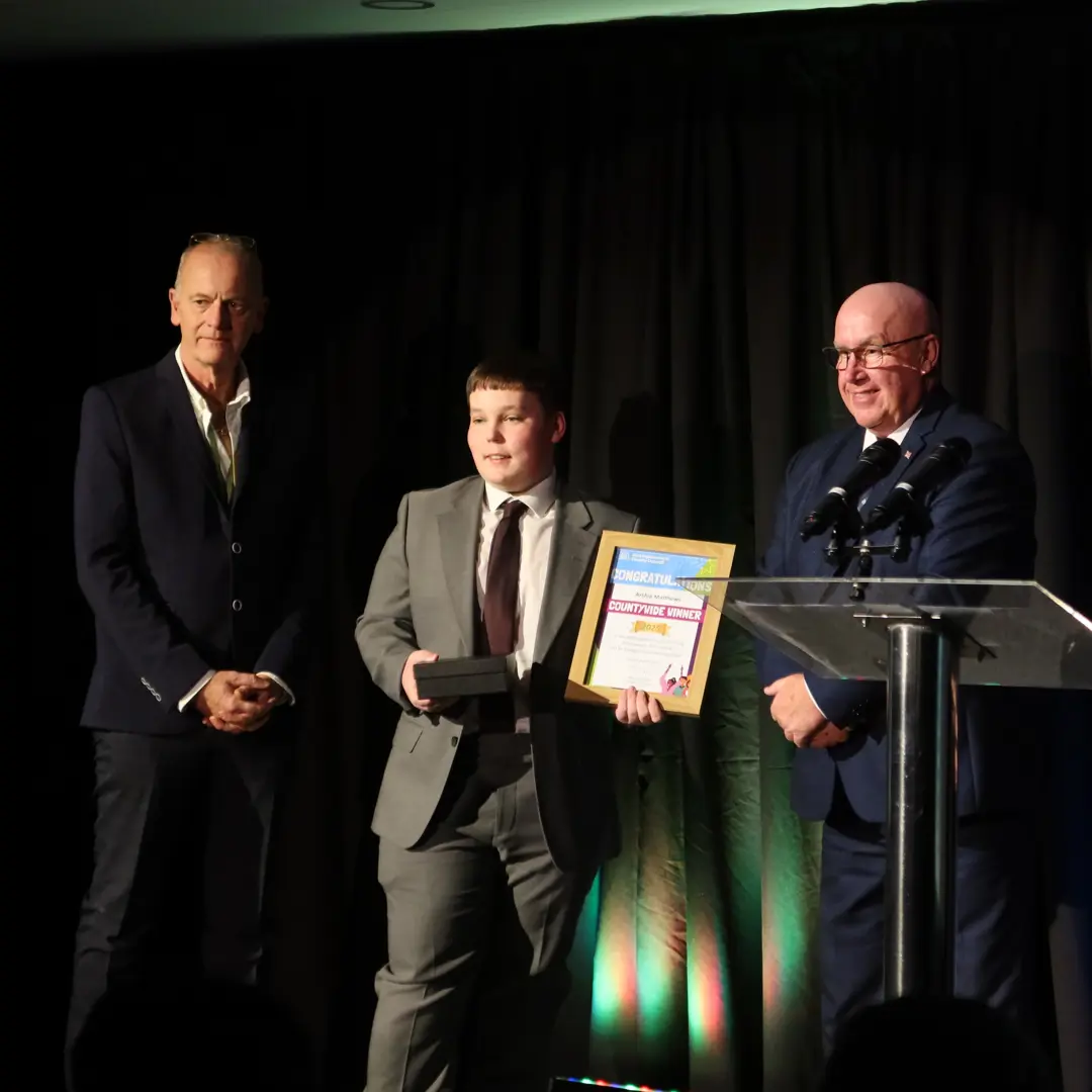 Archie Matthews accepting the Outstanding Achievement 4Uth Award 2025