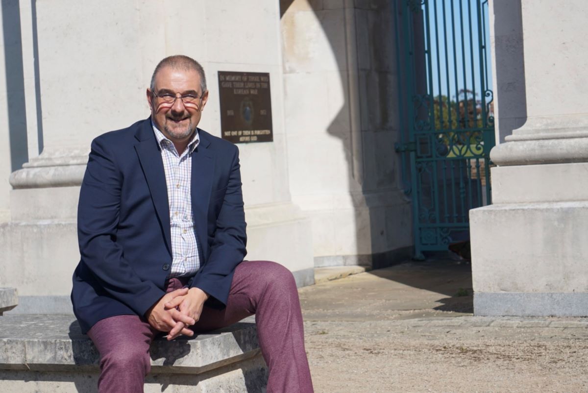 Cllr Kelvin Wright sat outside on the steps
